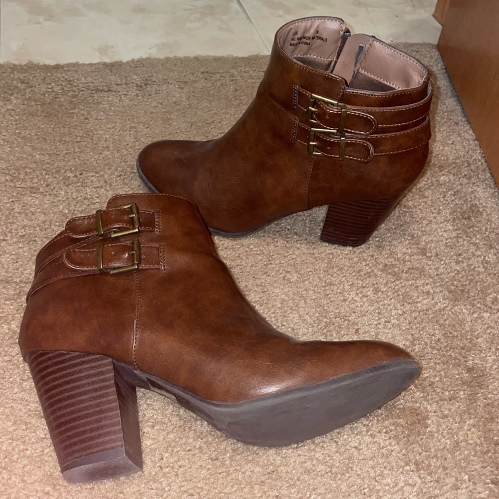 Brown buckle heeled booties